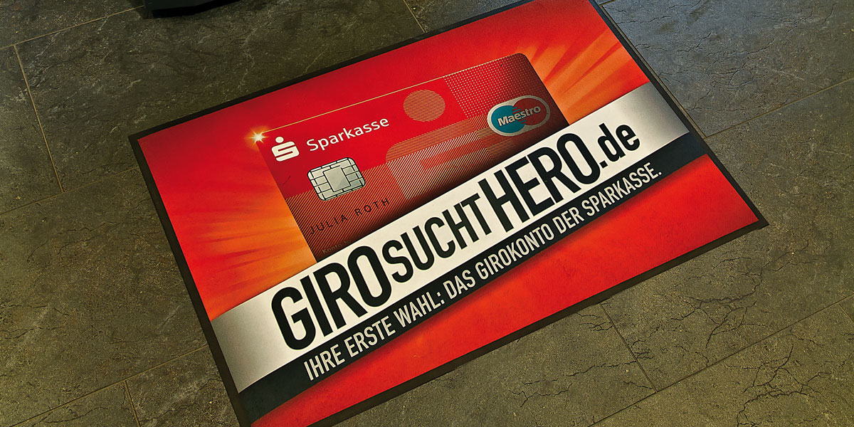 Ad-Mat Floormat – mata reklamująca kampanię Sparkasse "Giro sucht Hero" © Kleen-Tex